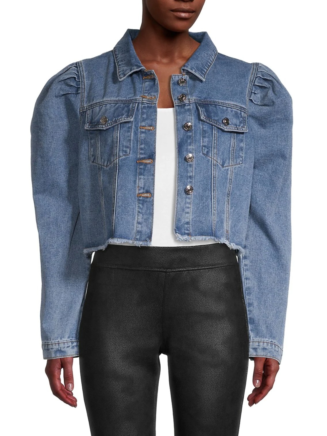model wearing the denim cropped jacket with a white shirt and black pants