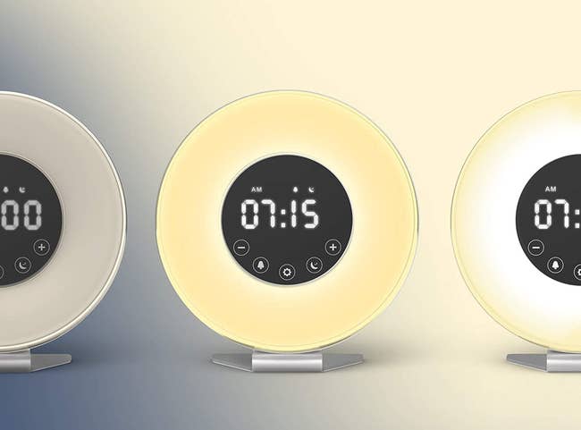 The round digital clock in three settings of brightness as time passes