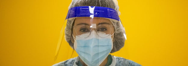 Doctor wearing a mask and face shield