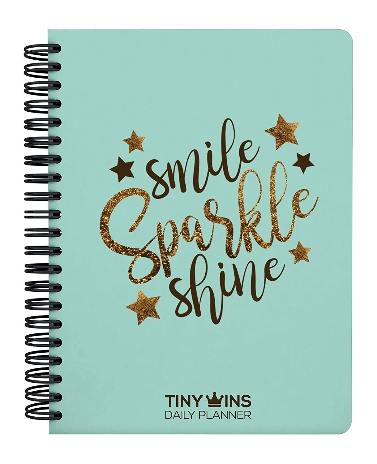 A spiral-bound journal with the words &#x27;Smile, sparkle, and shine&#x27; in matte and glittery text