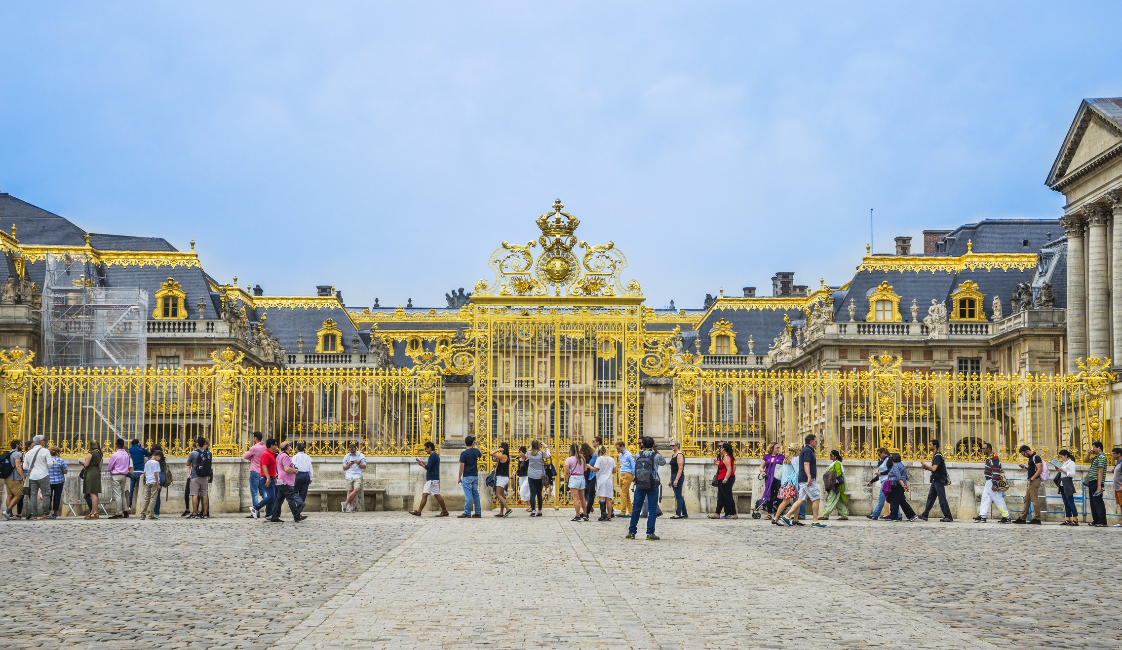 Tourists waiting in line at Versailles.