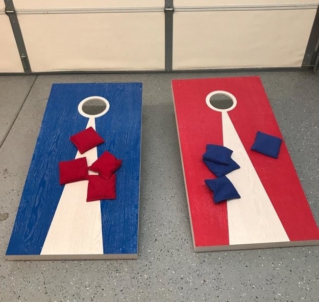 red and blue cornhole boards with red and blue beanbags