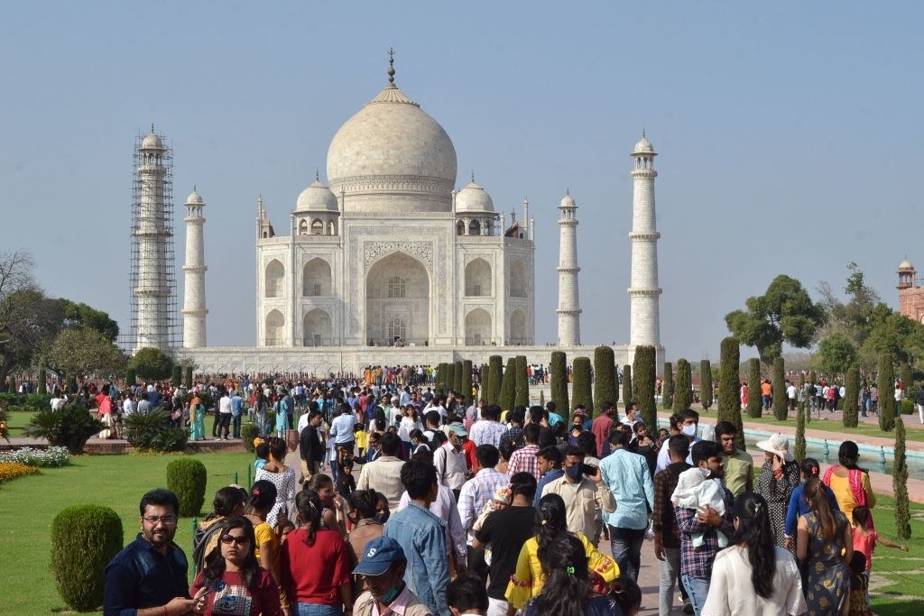 Tourists visiting the Taj Mahal.