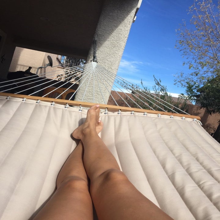 a reviewer in a white hammock