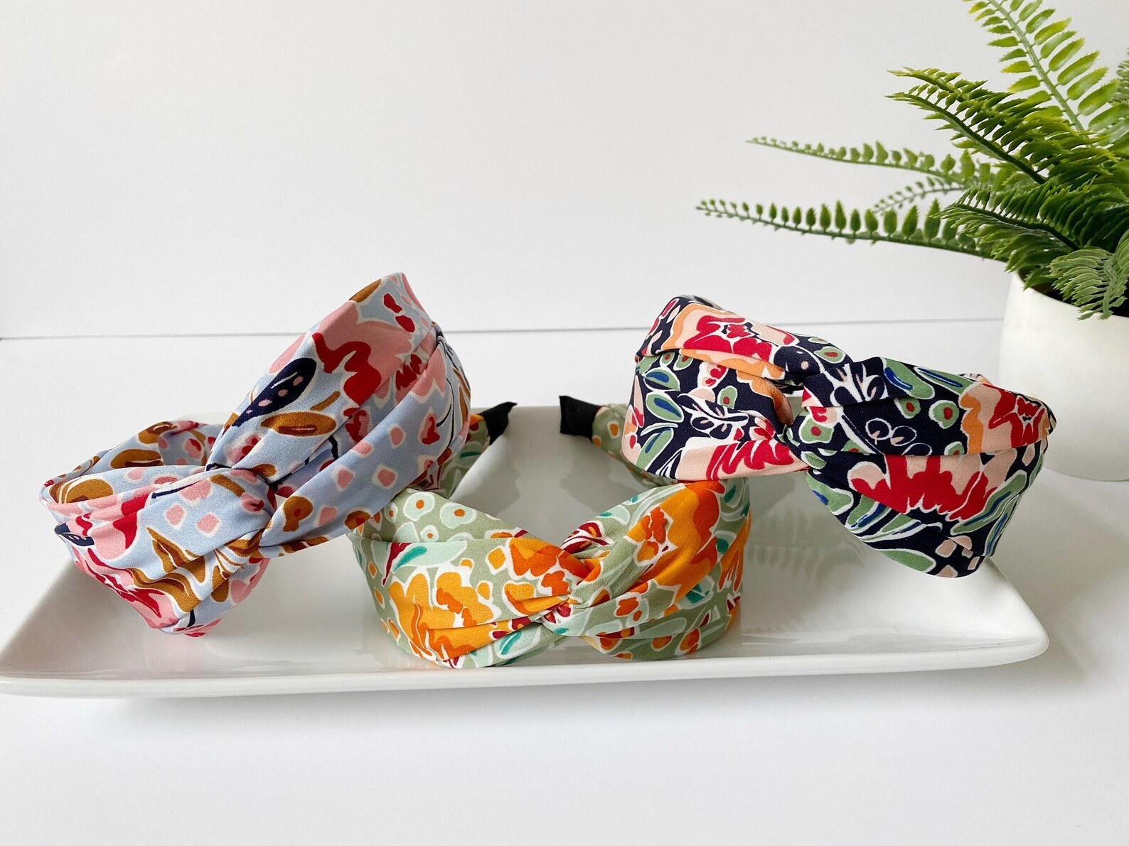 Three twist-top floral print headbands