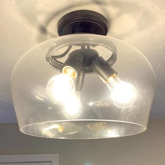 a reviewer photo of a foggy glass lampshade 