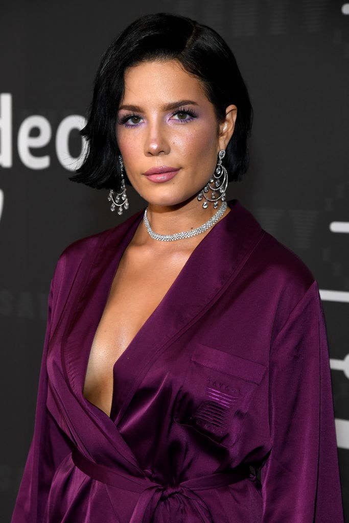 Halsey in a dark Savage X Fenty robe