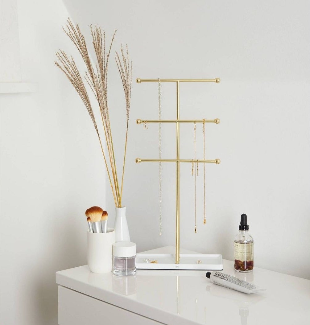 The brass jewelry storage stand