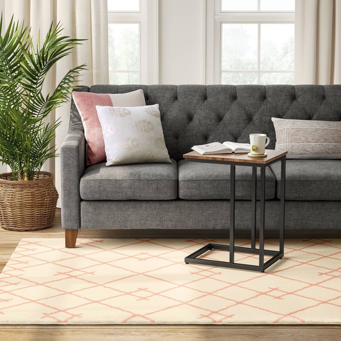 The blush pink tufted floor rug