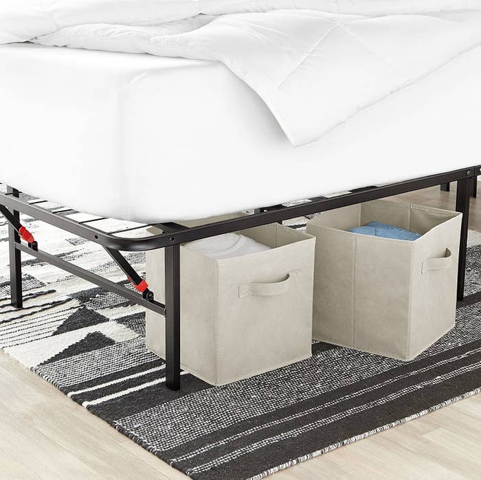 The storage cubes stowed under a bed