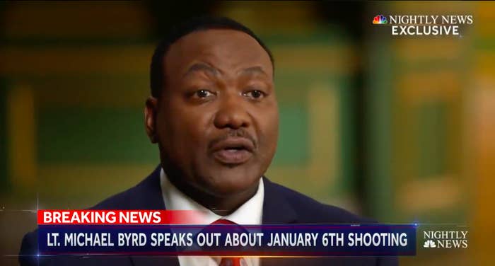 A screengrab from a news broadcast shows a man speaking above a chyron that reads "Lieutenant Michael Byrd speaks out about January 6th shooting"