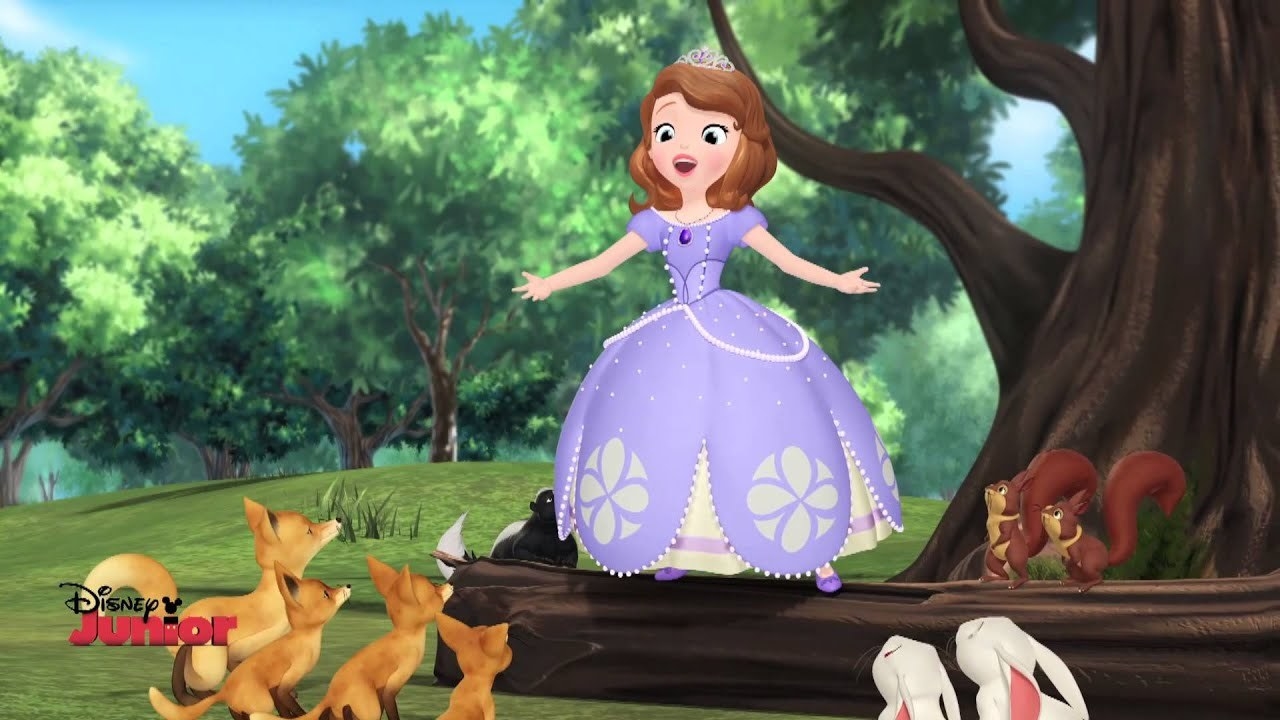 Sofia is in the woods, with several animals looking up at her