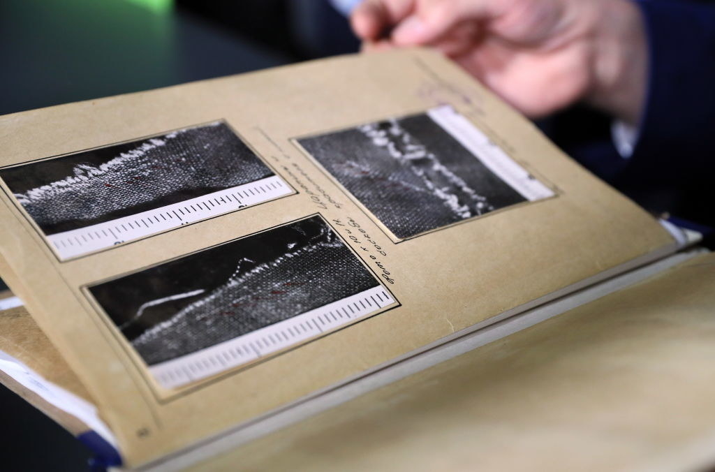 A document with photos from the original investigation into the accident