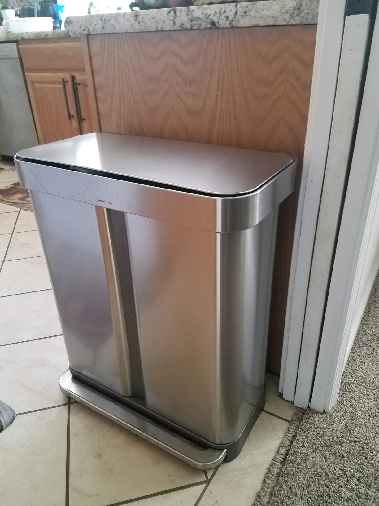 reviewer image of the dual step trash can in a kitchen