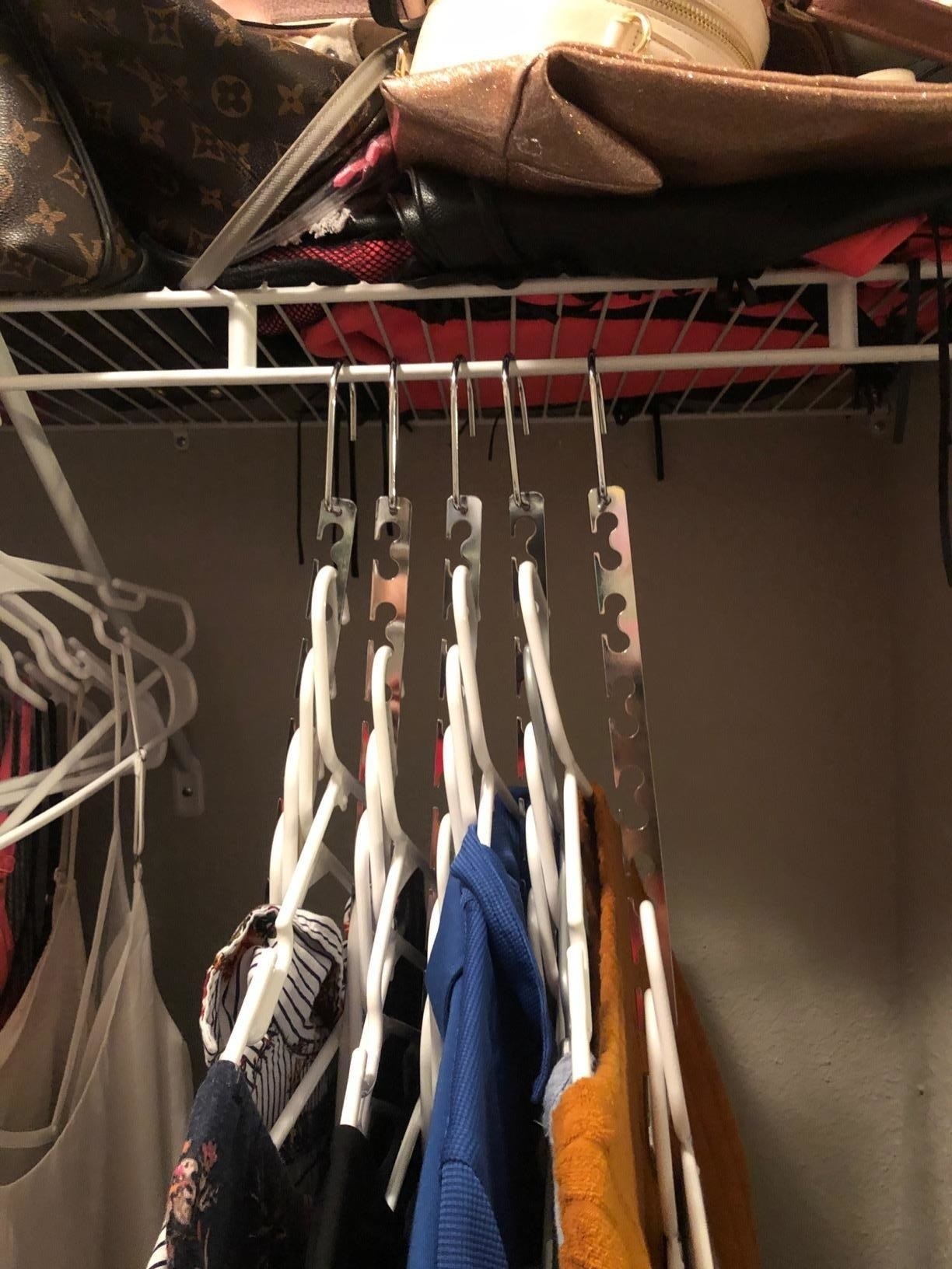 same reviewer showing the closet cascaders freeing up so much room on their clothes rack