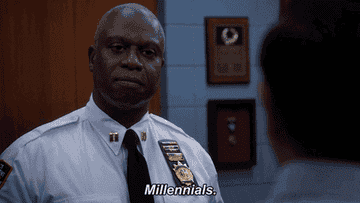 Captain Holt from Brooklyn 9 9 rolling his eyes and saying millennials