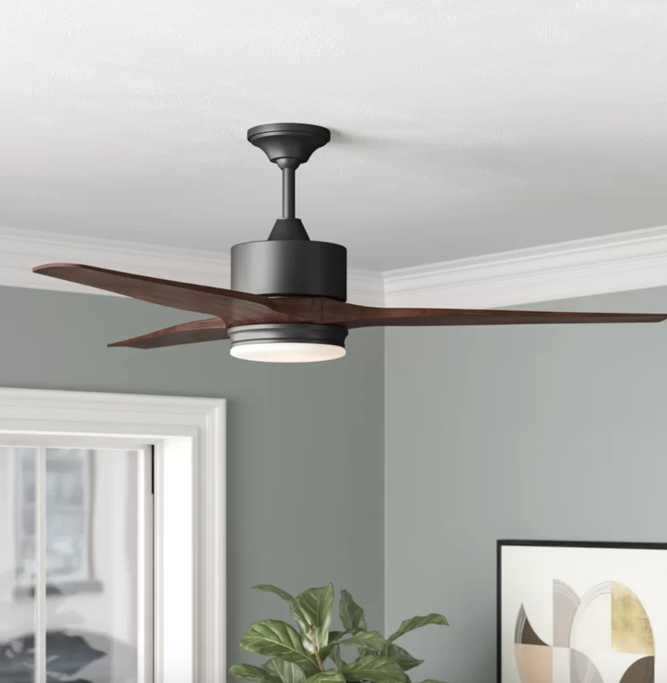 The fan has a black base, dark brown wooden blades and a white LED light
