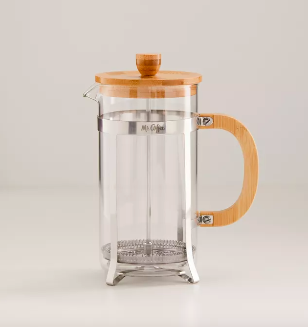 A French press coffee maker on a white background