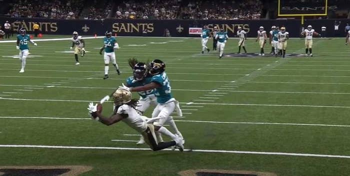 Saints player makes diving catch
