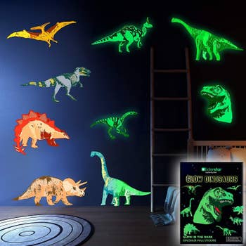 The dino decals glowing on a blue wall