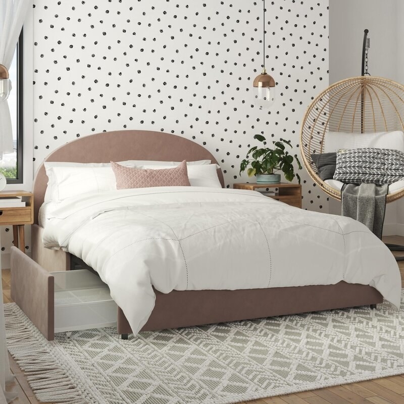 The bed in blush in a modern bedroom
