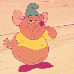 a gif of gus gus from cinderella checking out his new shoes and hat