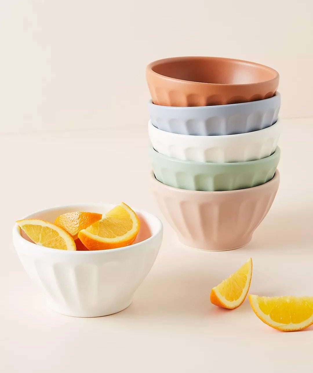 Several riveted bowls stacked on top of each other