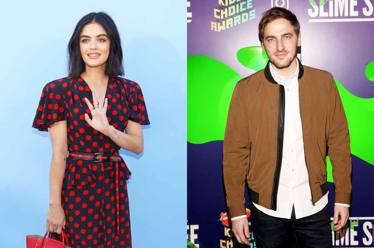 Lucy, holding a tote bag, smiles and waves, while Kendall in a jacket smiles on the Kids&#x27; Choice Awards red carpet