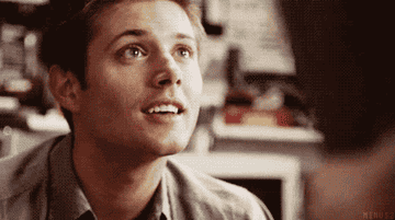 Dean from a scene in Supernatural smiling