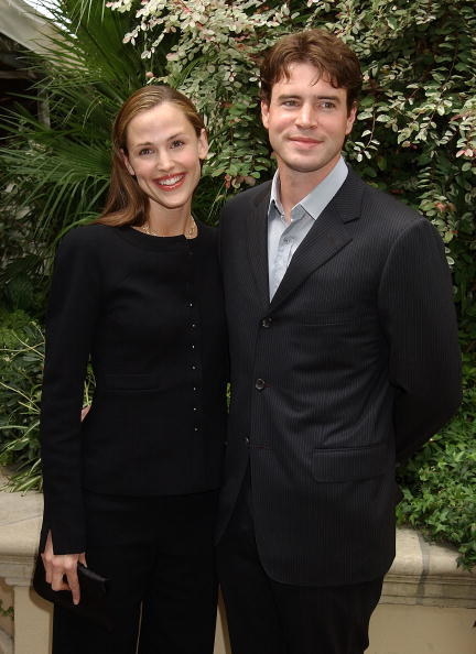 Jennifer and Scott standing together and smiling