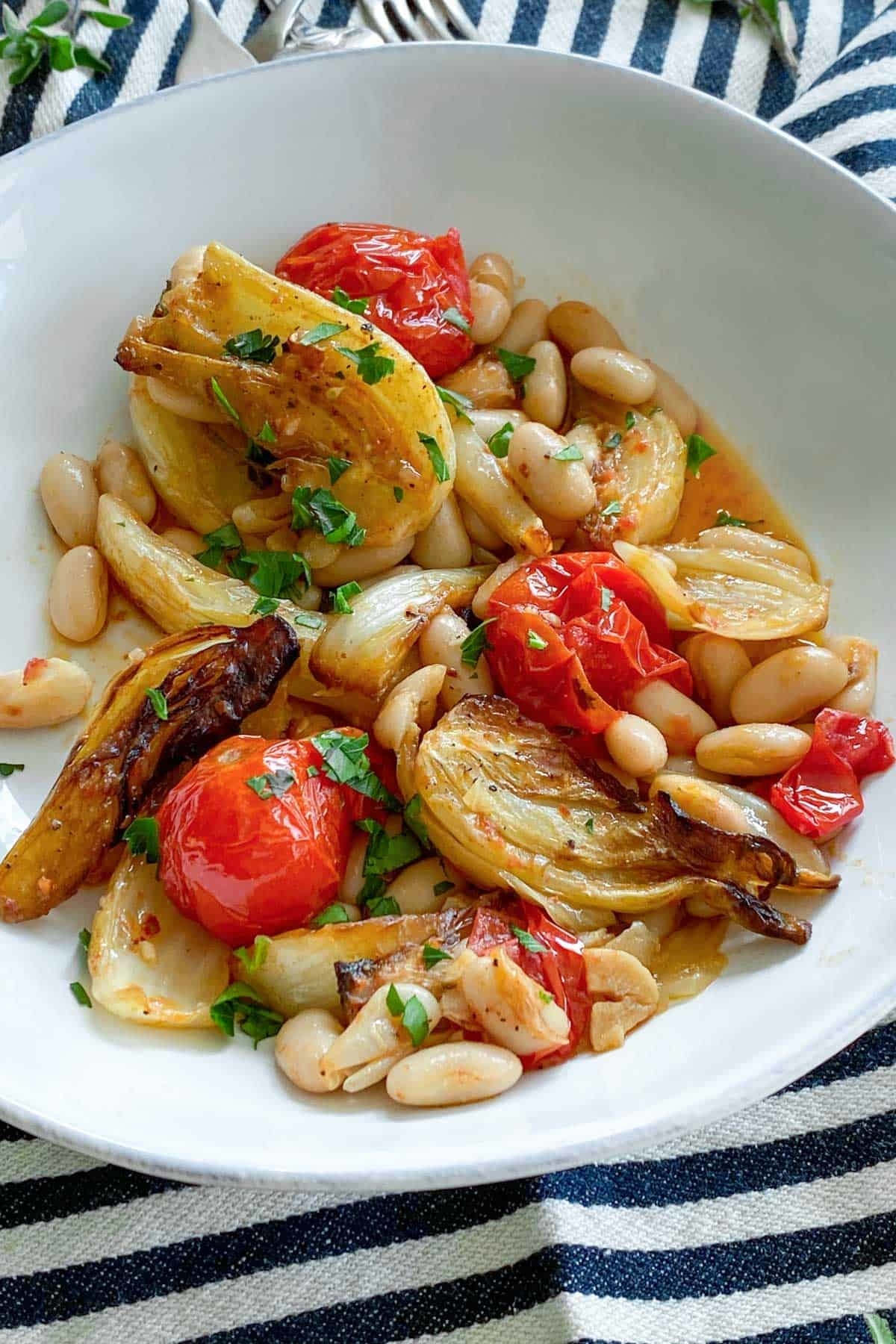 Roasted fennel with white beans and tomatoes.