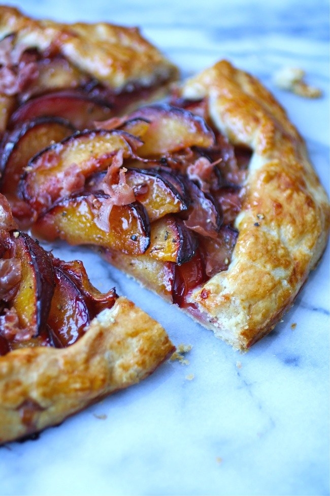 A galette with prosciutto and plums.
