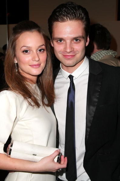 Leighton and Sebastian standing together and smiling