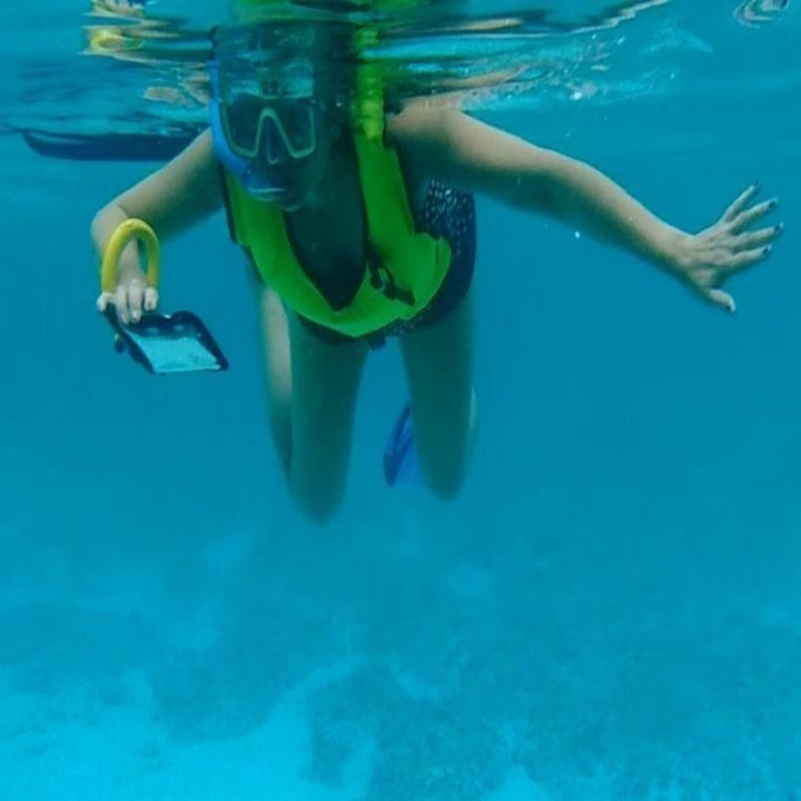 Reviewer using phone case underwater