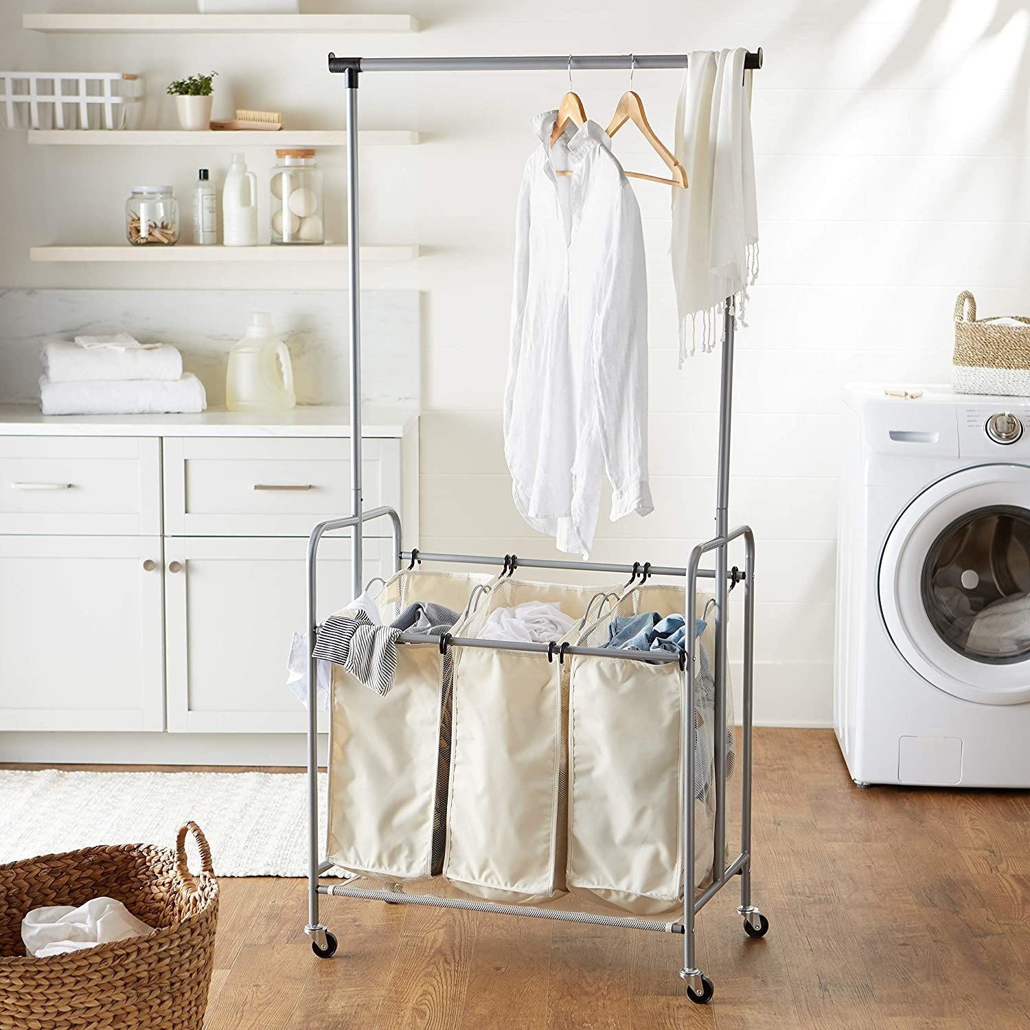 The laundry hamper filled with clothes in a laundry room