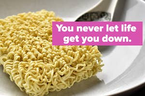 a block of uncooked ramen with the words "you never let life get you down" over it