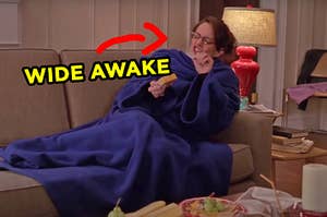 Liz Lemon from "30 Rock" sitting on a couch in a Snuggie working on her night cheese with an arrow pointing to her and "wide awake" typed under her face