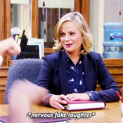 GIF of Amy Poehler nervous laughing.