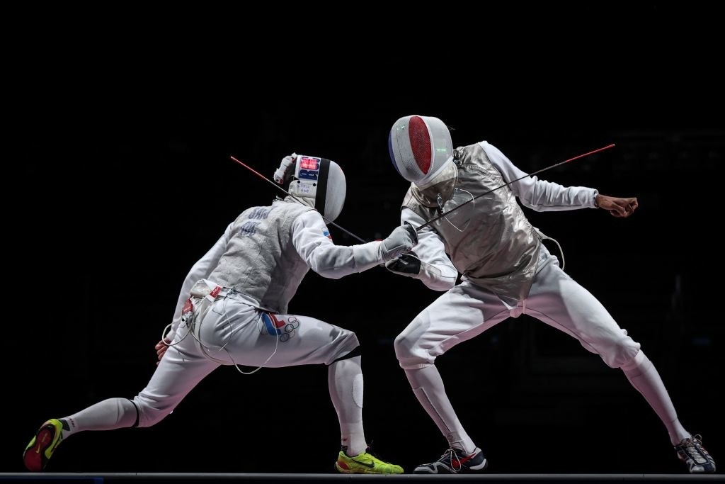 Two fencers fighting