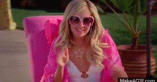 Sharpay Evans waving in a lounge chair