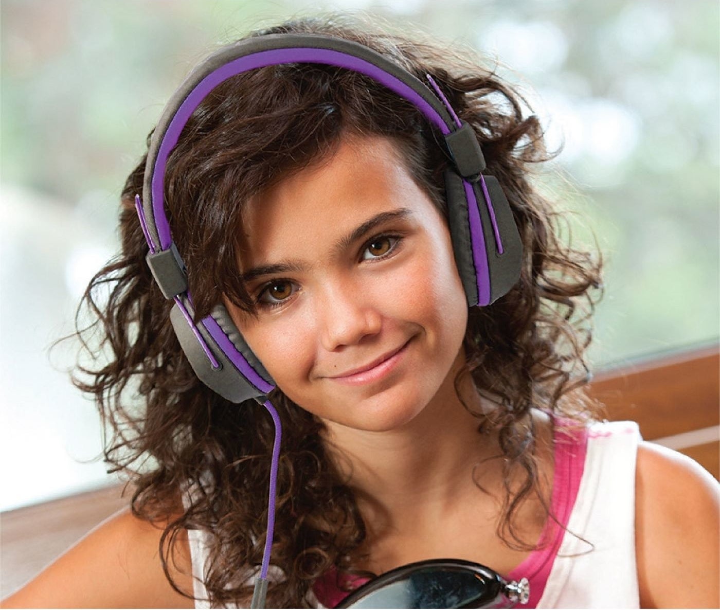 kid wearing purple and gray headphones