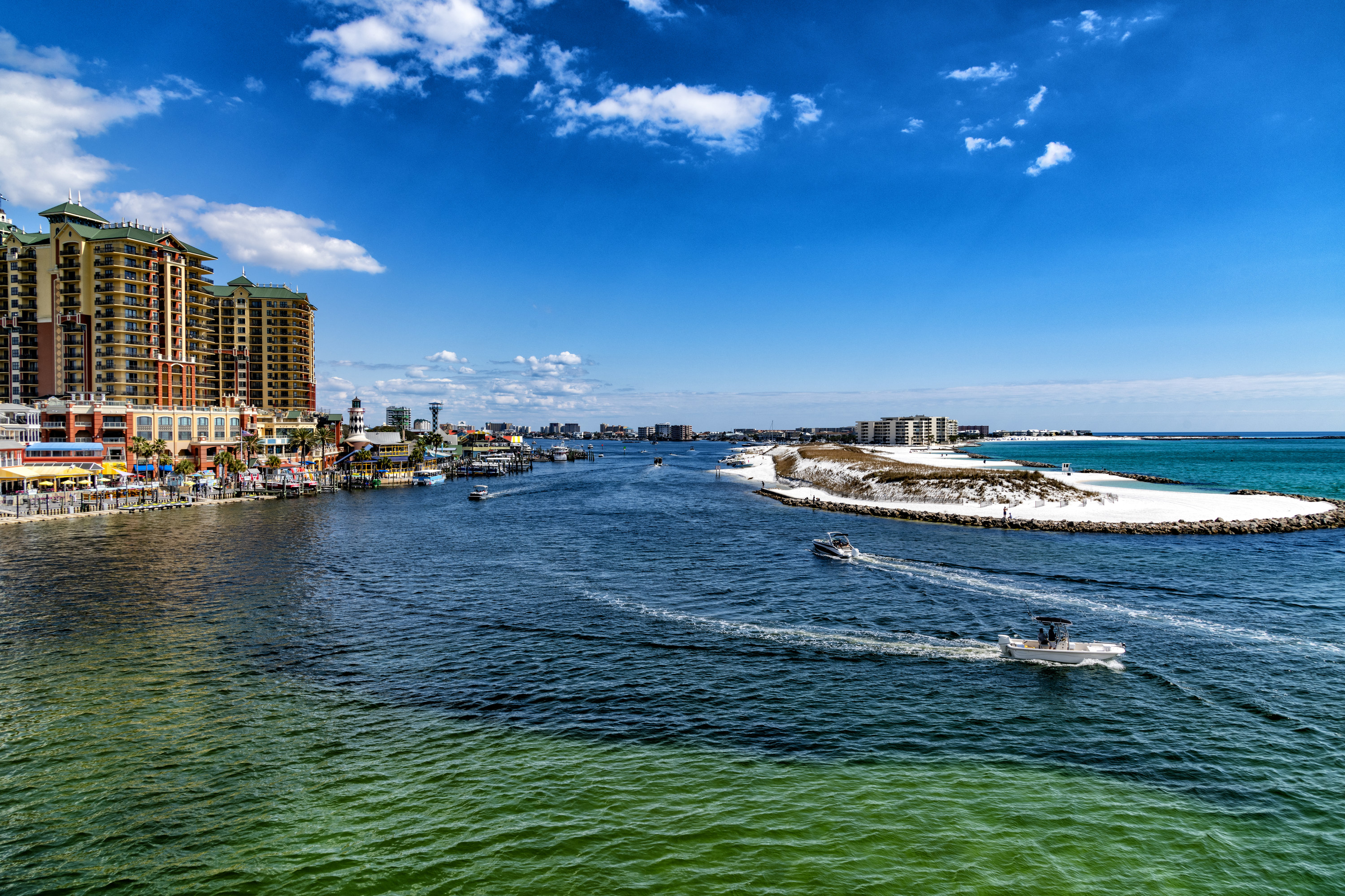 Photo of the ocean and city buildings in Destin