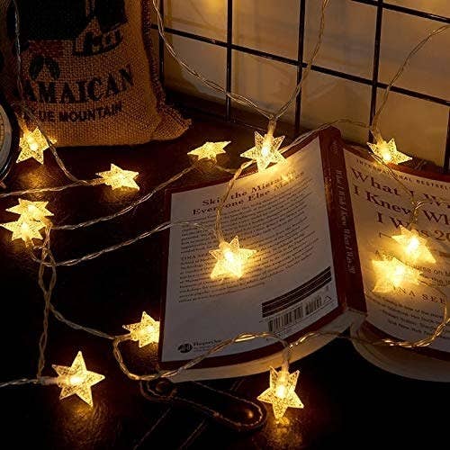 Star-shaped lights on top of a book