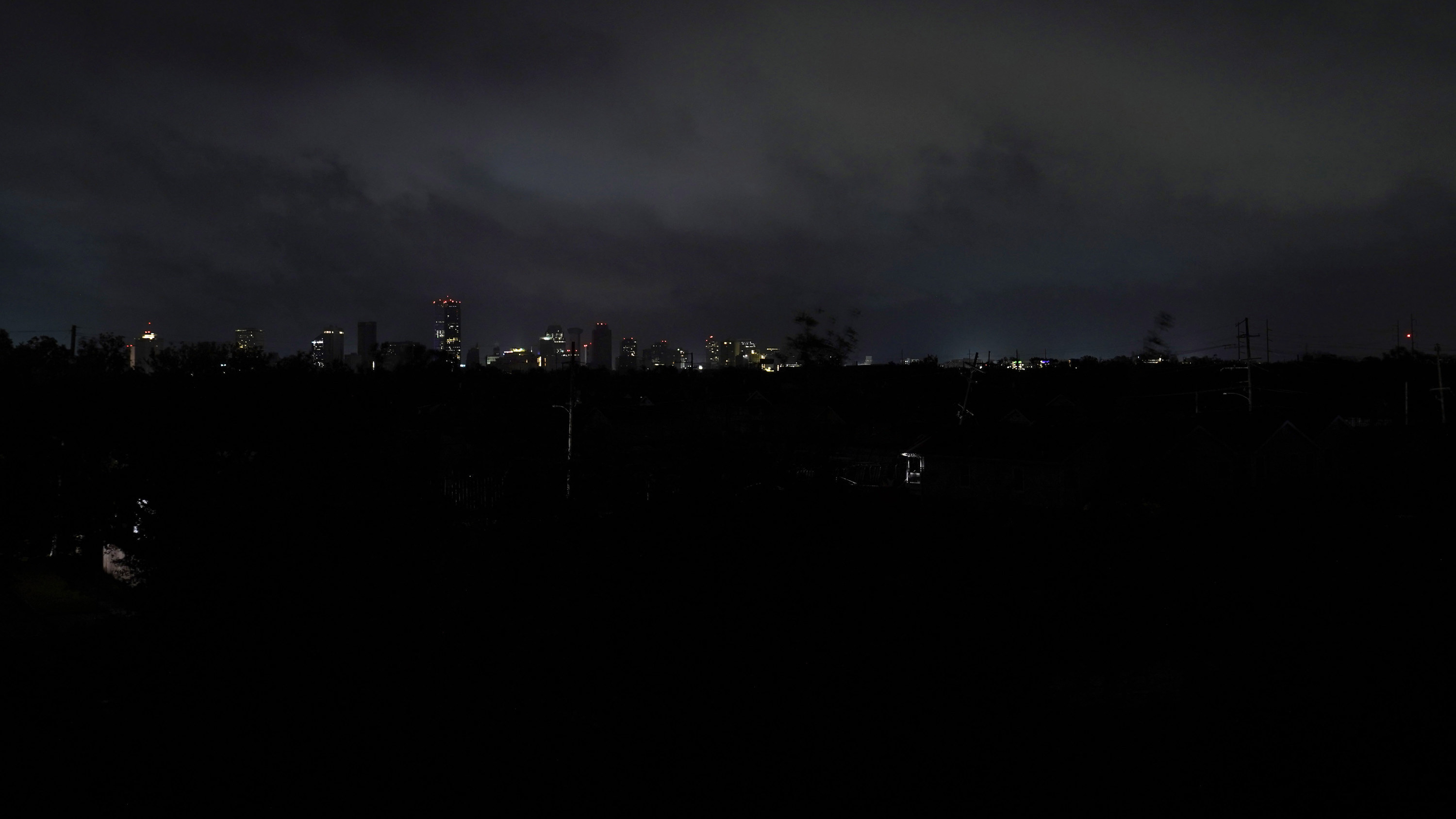 Downtown buildings relying on generator power are seen as the entire city of New Orleans is without power in the aftermath of Hurricane Ida