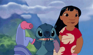 a gif of stitch falling off a tricycle