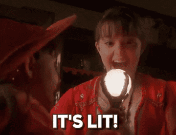 GIF of kids from &quot;Halloweentown&quot; lighting up crystal ball and saying &quot;It&#x27;s LIT!&quot;