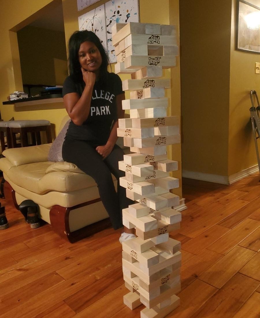 a reviewer photo of the large jenga set being played with
