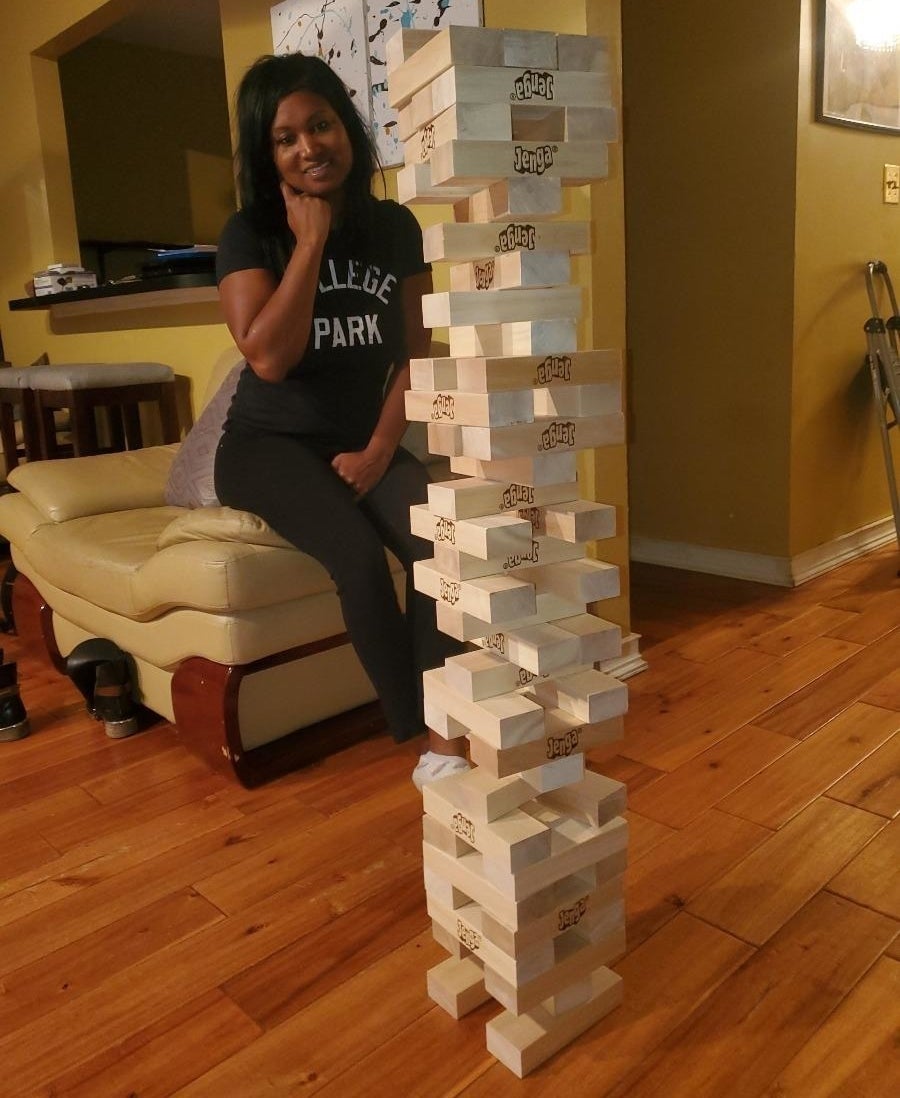 a reviewer photo of the large jenga set being played with