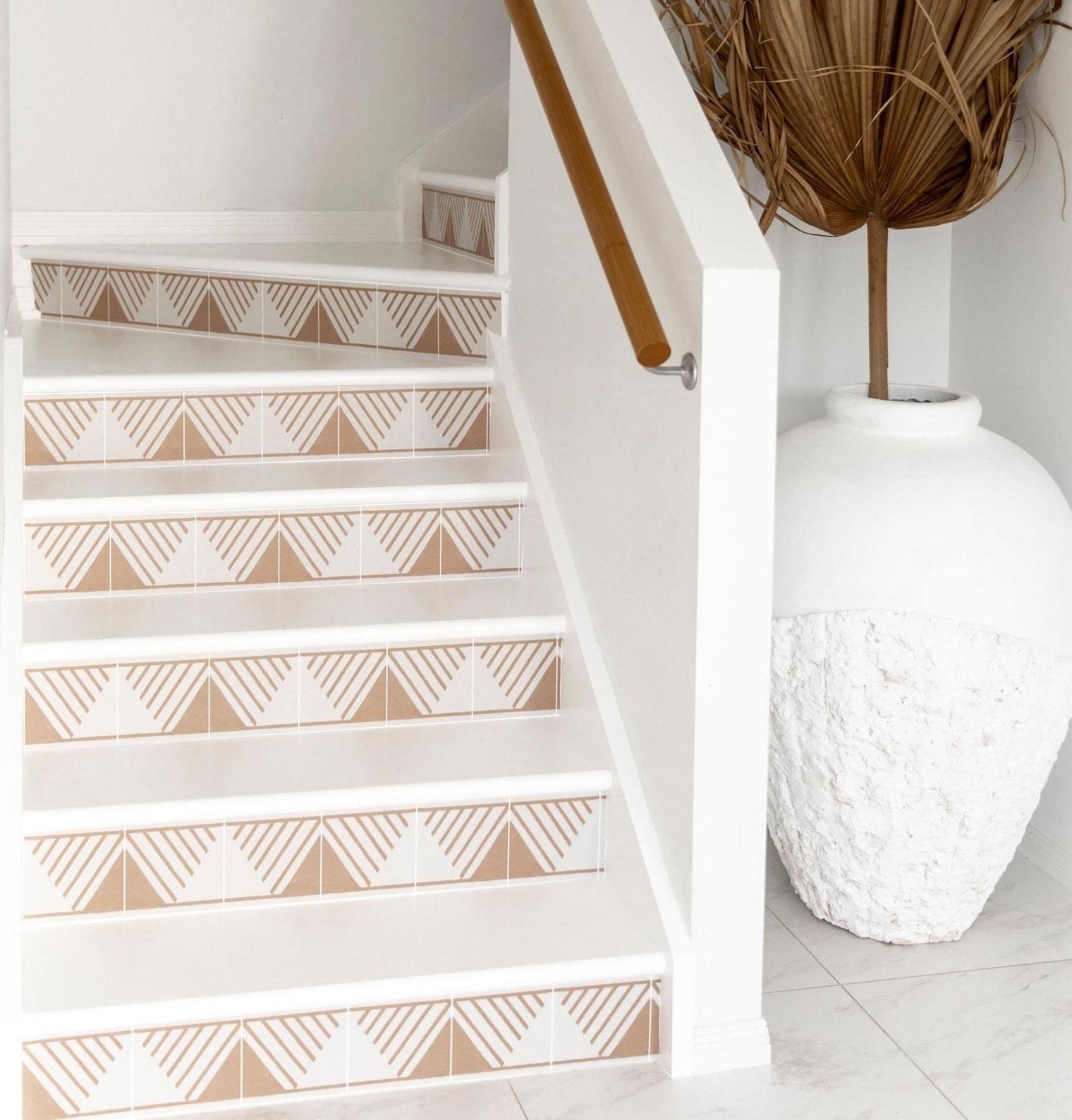 tan triangle with lines stickers on the vertical part of a set of stairs