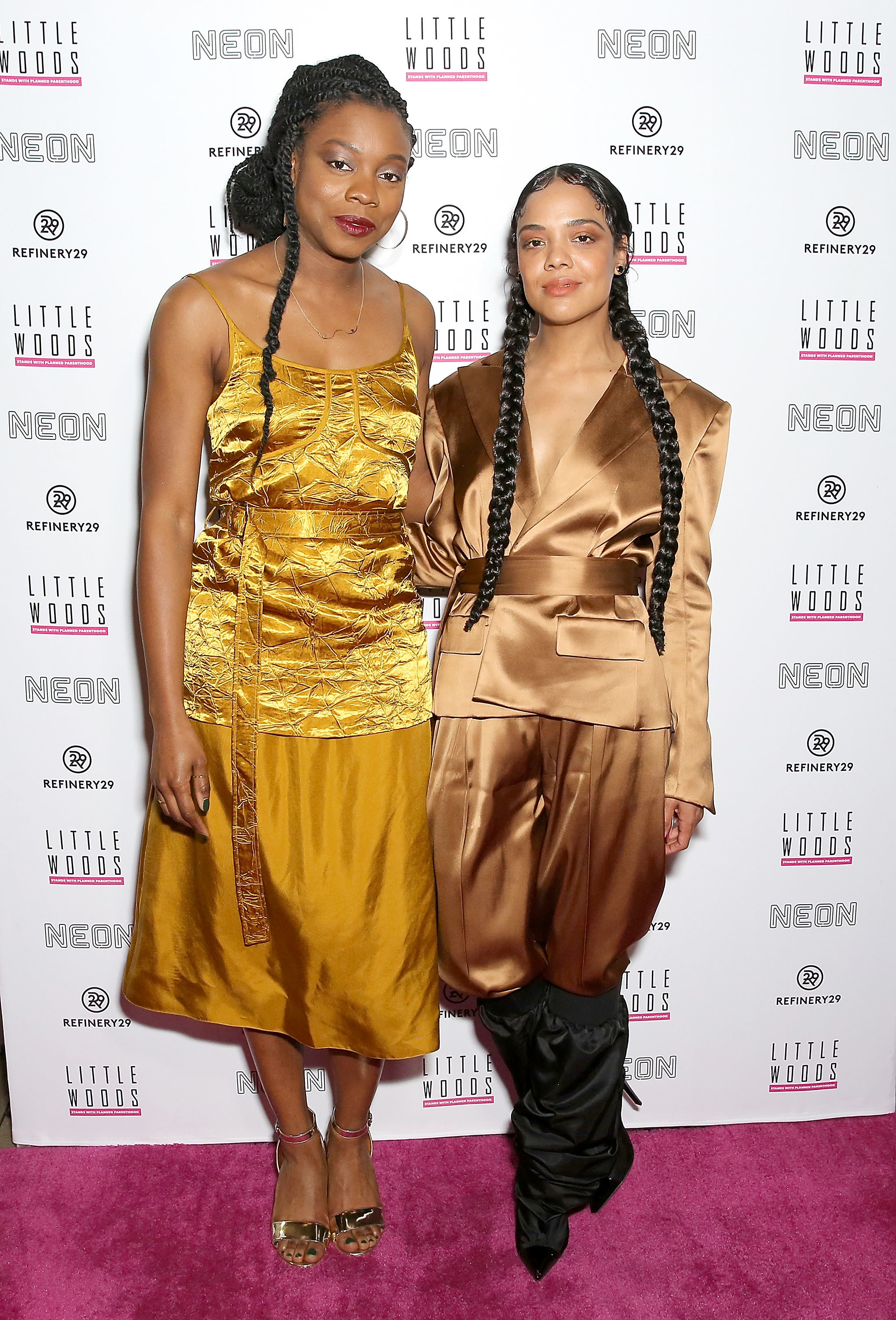 Nia and Tessa Thompson posing on the red carpet